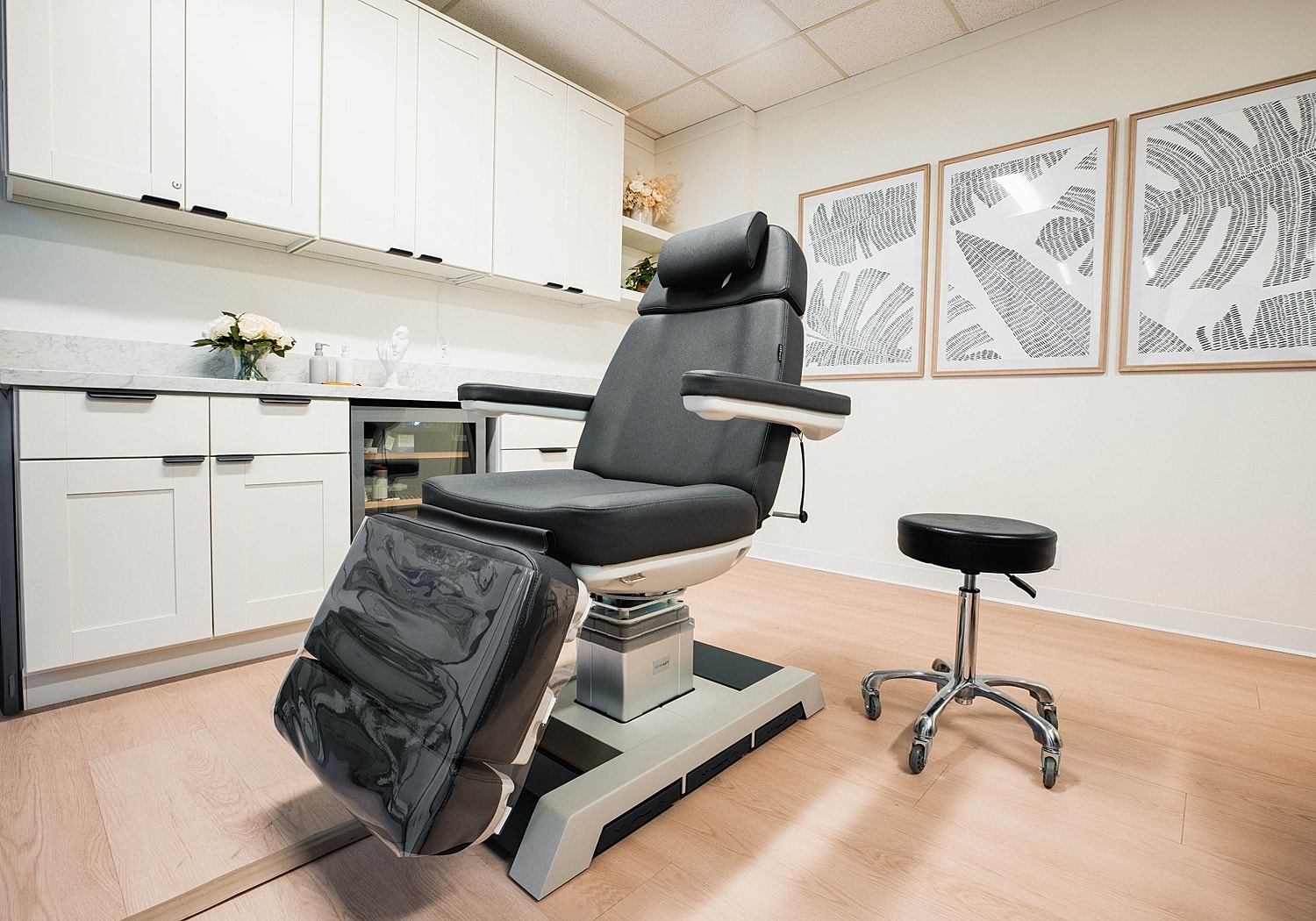 Modern beauty treatment room with adjustable chair.