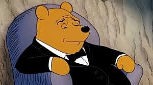 Cartoon bear relaxing in a tuxedo chair.
